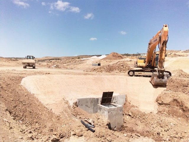 Travaux de construction d'un lac collinaire - Rouhia